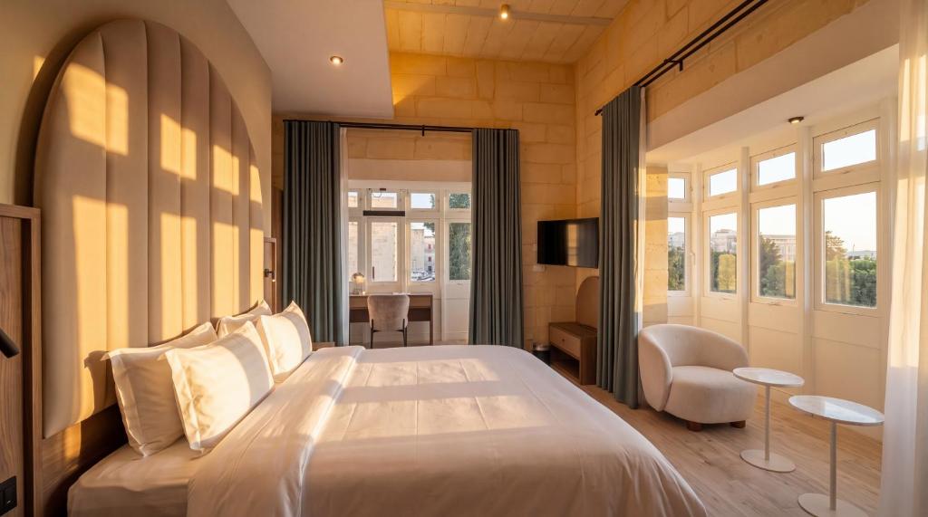 Suite with panoramic windows and city views at St Anne Palace, Floriana, Malta